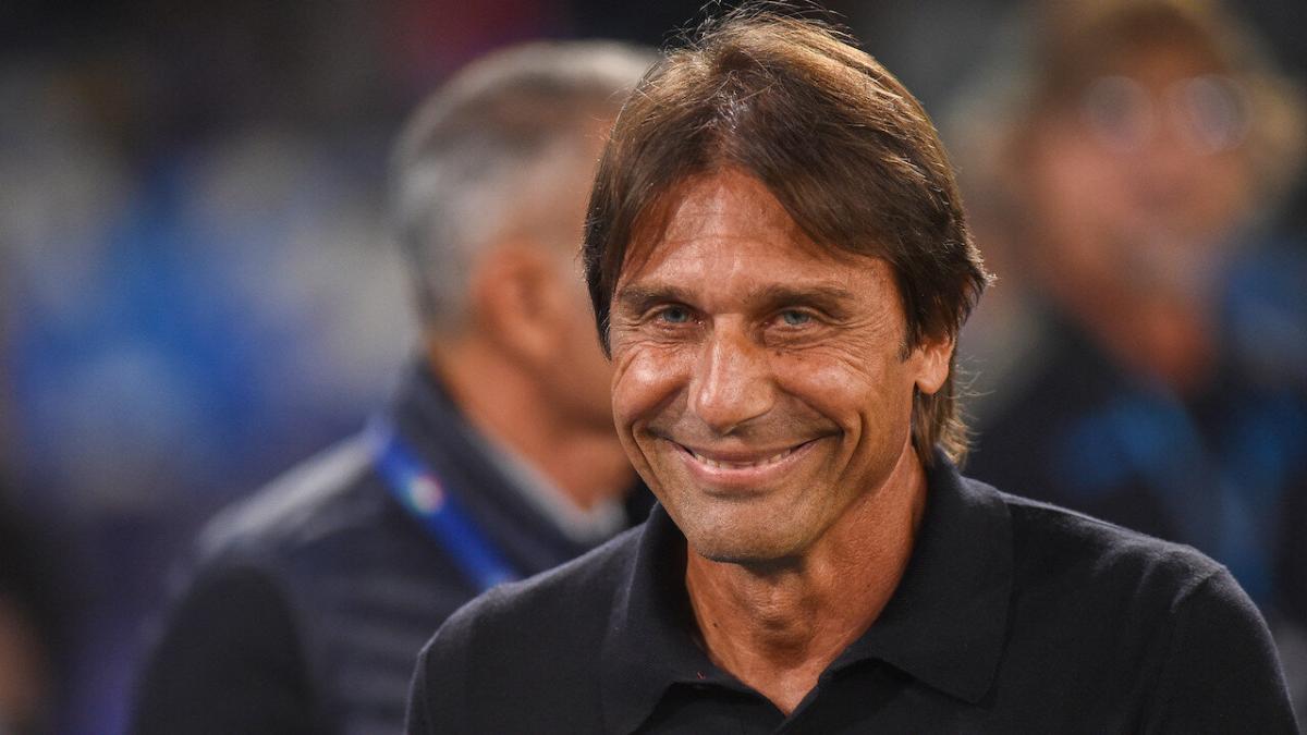 Napoli coach Antonio Conte smiles